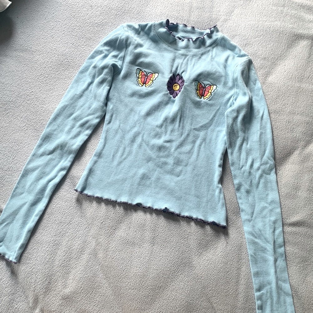 Women's Crop top long sleeve. Ruffled edges. Size Small. Never Worn